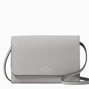 kate spade kerri small flap wallet on a string